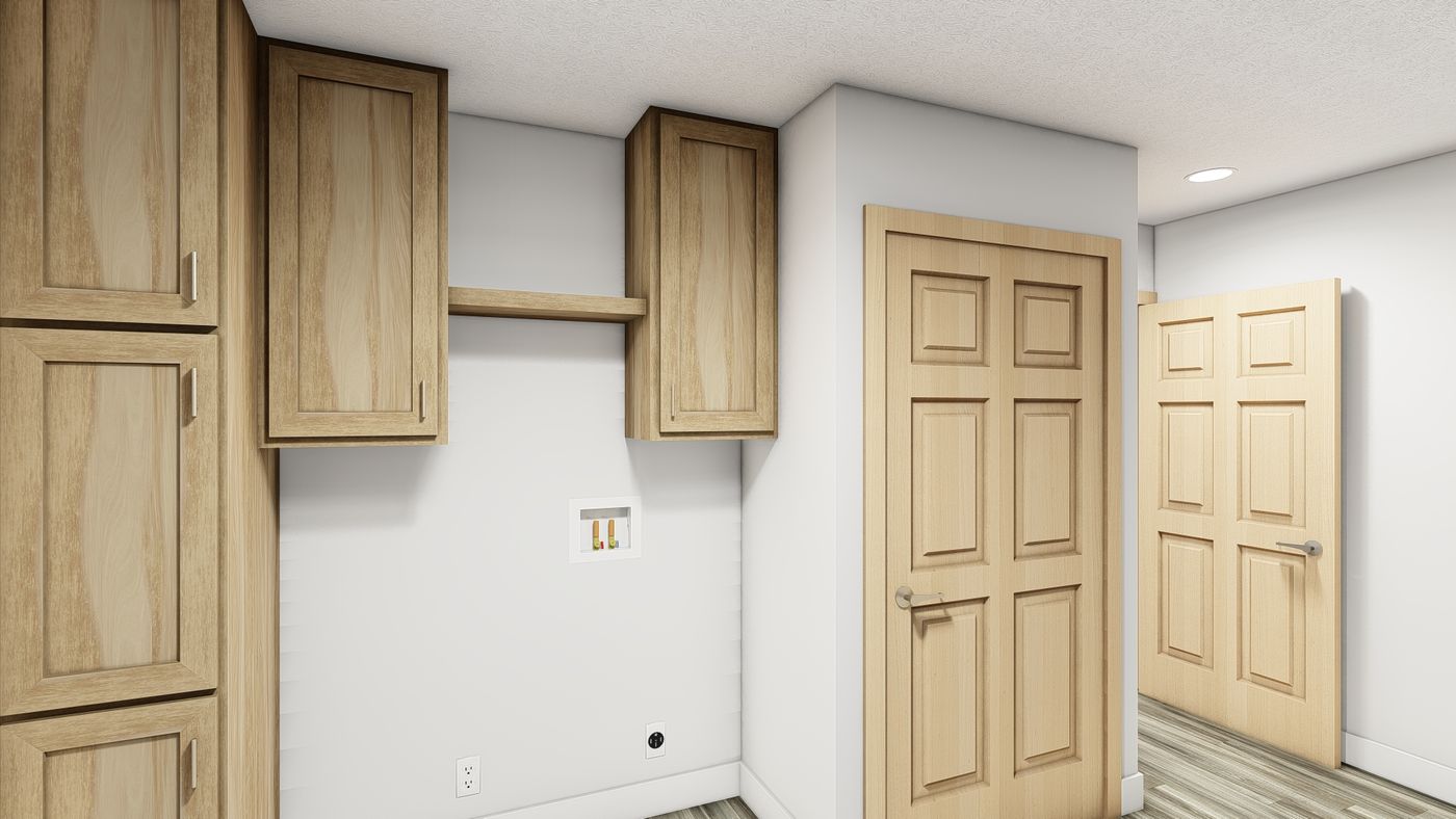 The LEGACY 377 Utility Room. This Manufactured Mobile Home features 3 bedrooms and 2 baths.