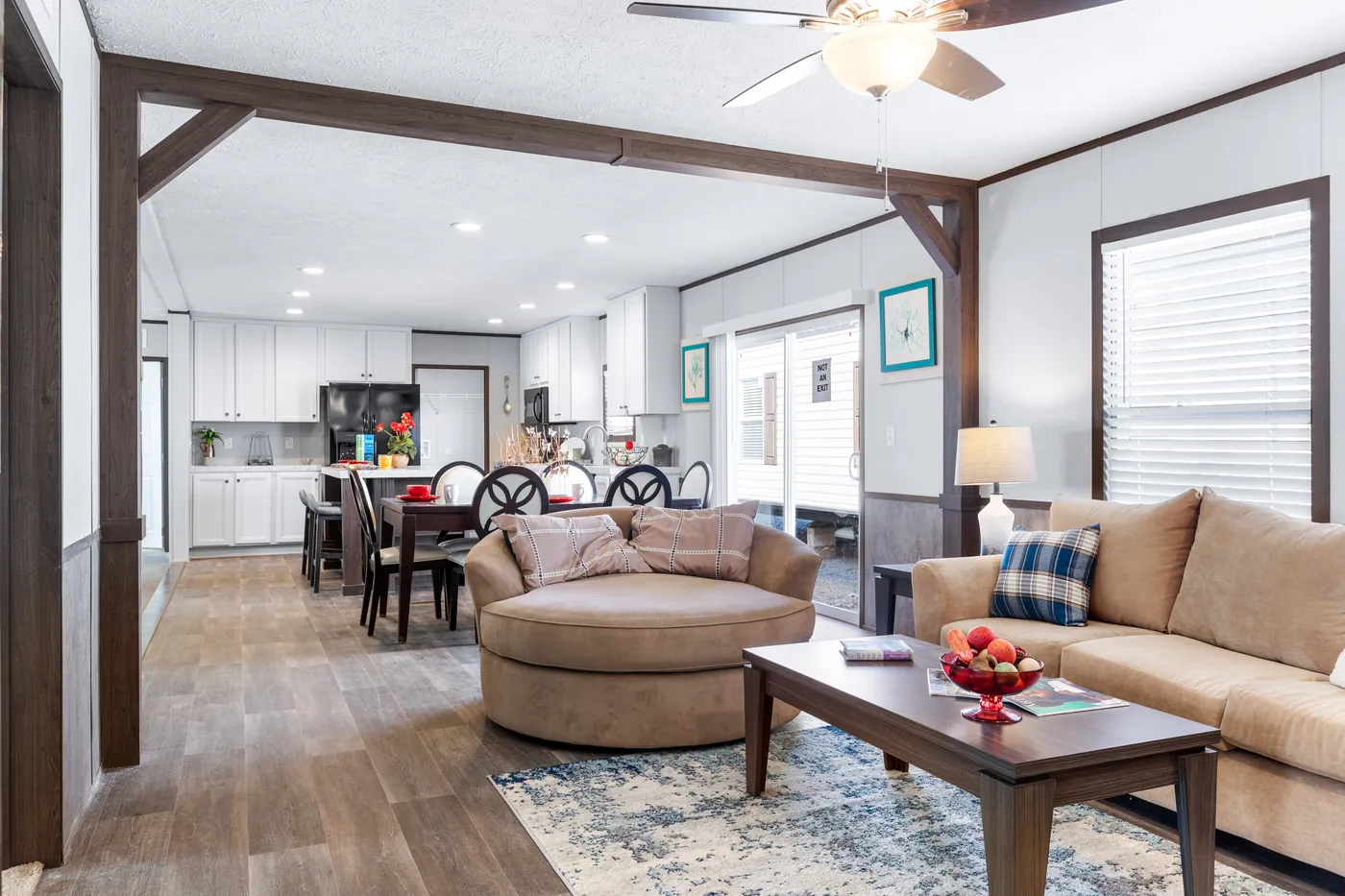 The THE SUNDOWNER Den. This Manufactured Mobile Home features 3 bedrooms and 2 baths.