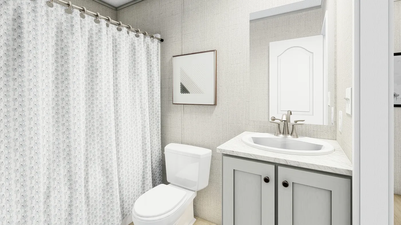The COASTAL BREEZE I  16X72 Guest Bathroom. This Manufactured Mobile Home features 3 bedrooms and 2 baths.