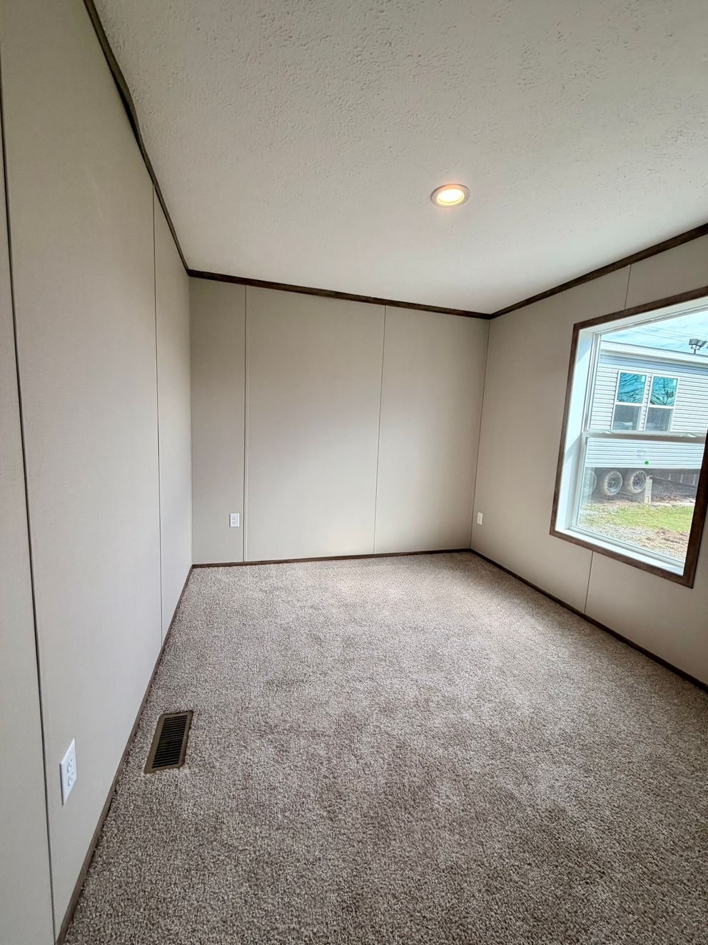 The APATITE Guest Bedroom. This Manufactured Mobile Home features 3 bedrooms and 2 baths.