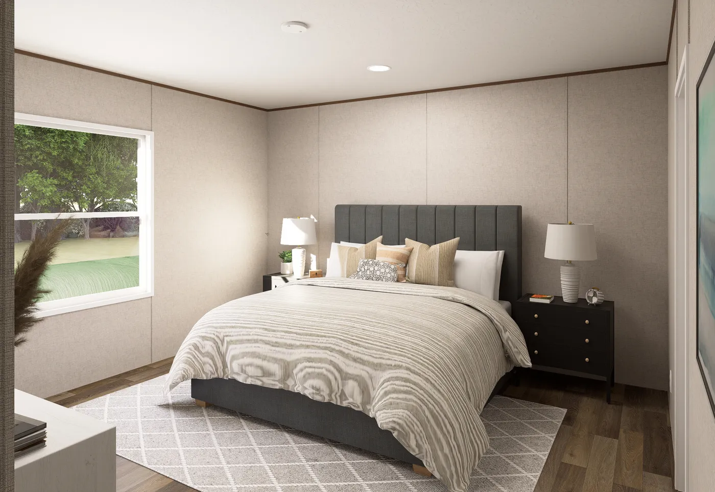 The MAPLE Primary Bedroom. This Manufactured Mobile Home features 3 bedrooms and 2 baths.
