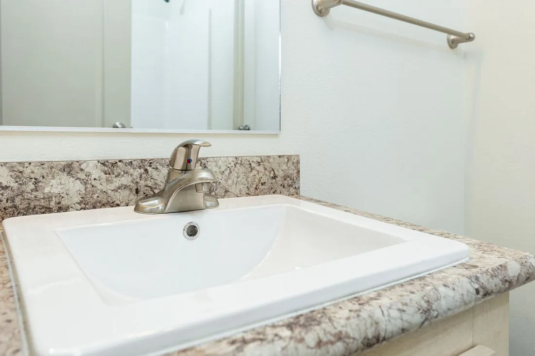 The 2017 COLUMBIA RIVER (NEW) Guest Bathroom. This Manufactured Mobile Home features 3 bedrooms and 2 baths.