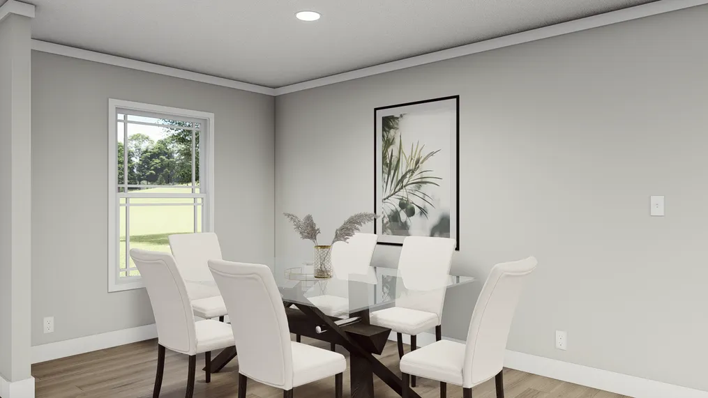 The THE BREEZE Dining Area. This Manufactured Mobile Home features 3 bedrooms and 2 baths.