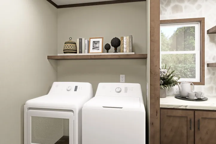The RIO Utility Room. This Manufactured Mobile Home features 3 bedrooms and 2 baths.