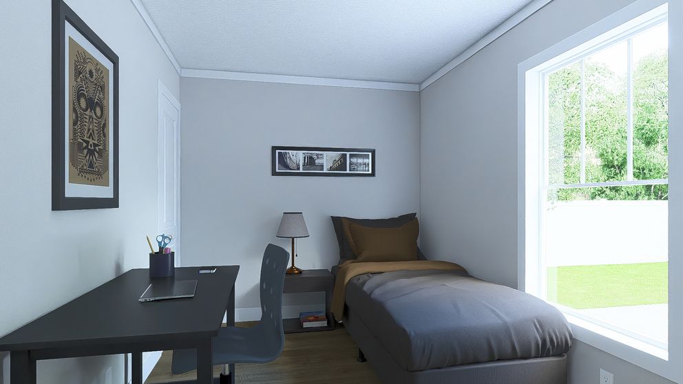 The RHYTHM NATION Guest Bedroom. This Manufactured Mobile Home features 3 bedrooms and 2 baths.