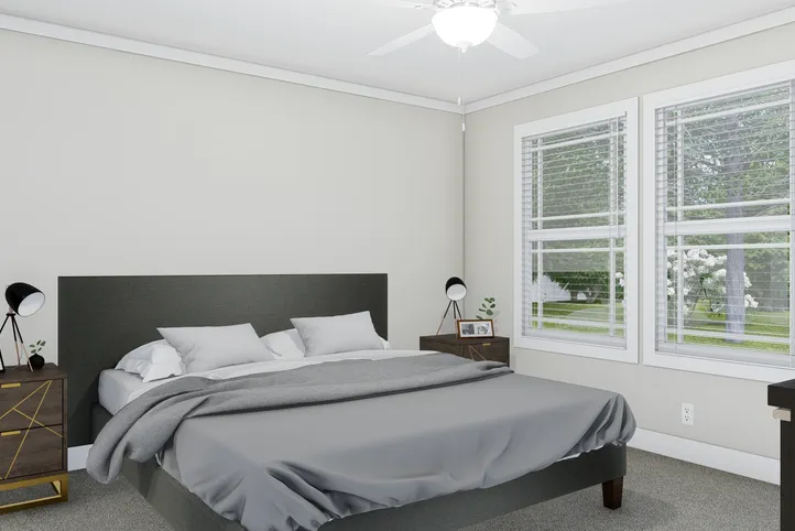 The CLASSIC 56D Primary Bedroom. This Manufactured Mobile Home features 3 bedrooms and 2 baths.