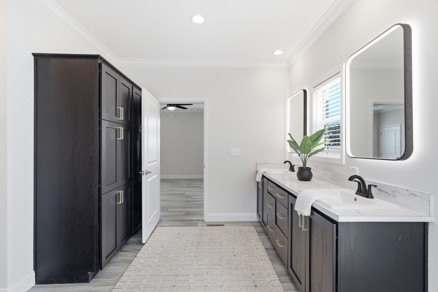 The THE SUMMIT Primary Bathroom. This Manufactured Mobile Home features 3 bedrooms and 2 baths.