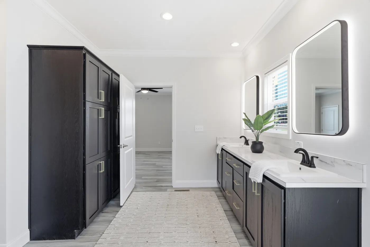 The THE SUMMIT Primary Bathroom. This Manufactured Mobile Home features 3 bedrooms and 2 baths.