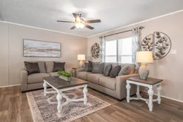The TRADITION 2868B Living Room. This Manufactured Mobile Home features 4 bedrooms and 2 baths.