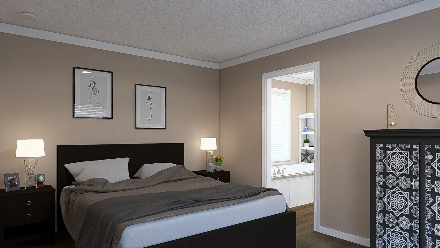The THE DREAM Primary Bedroom. This Manufactured Mobile Home features 3 bedrooms and 2 baths.