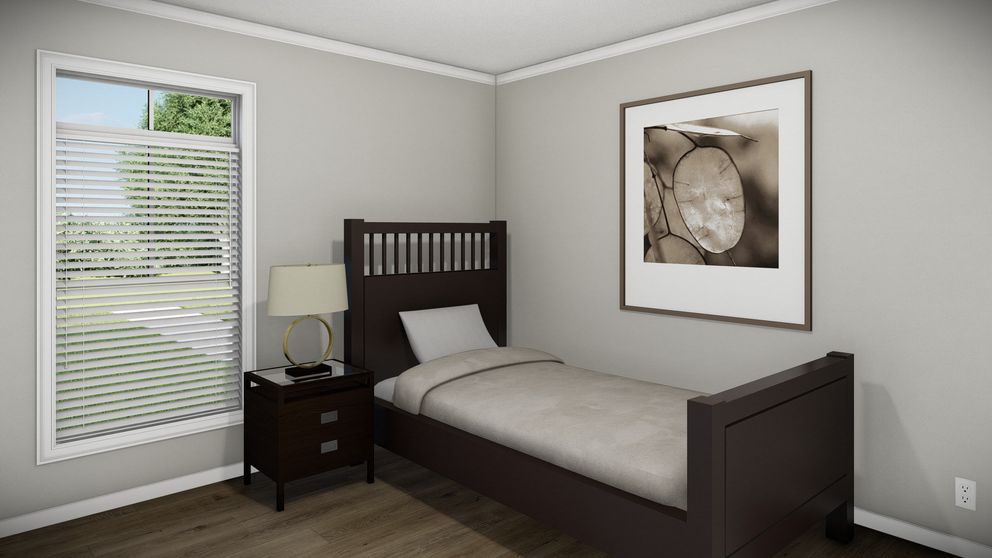 The HUXTON II Guest Bedroom. This Manufactured Mobile Home features 4 bedrooms and 2 baths.