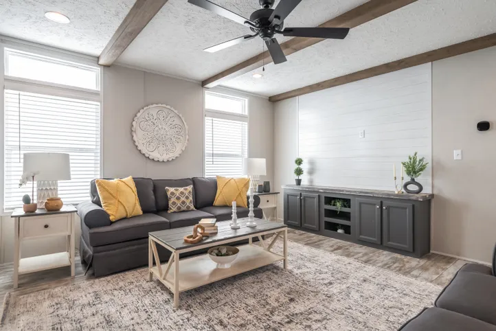 The ANNIVERSARY CHOICE Living Room. This Manufactured Mobile Home features 3 bedrooms and 2 baths.