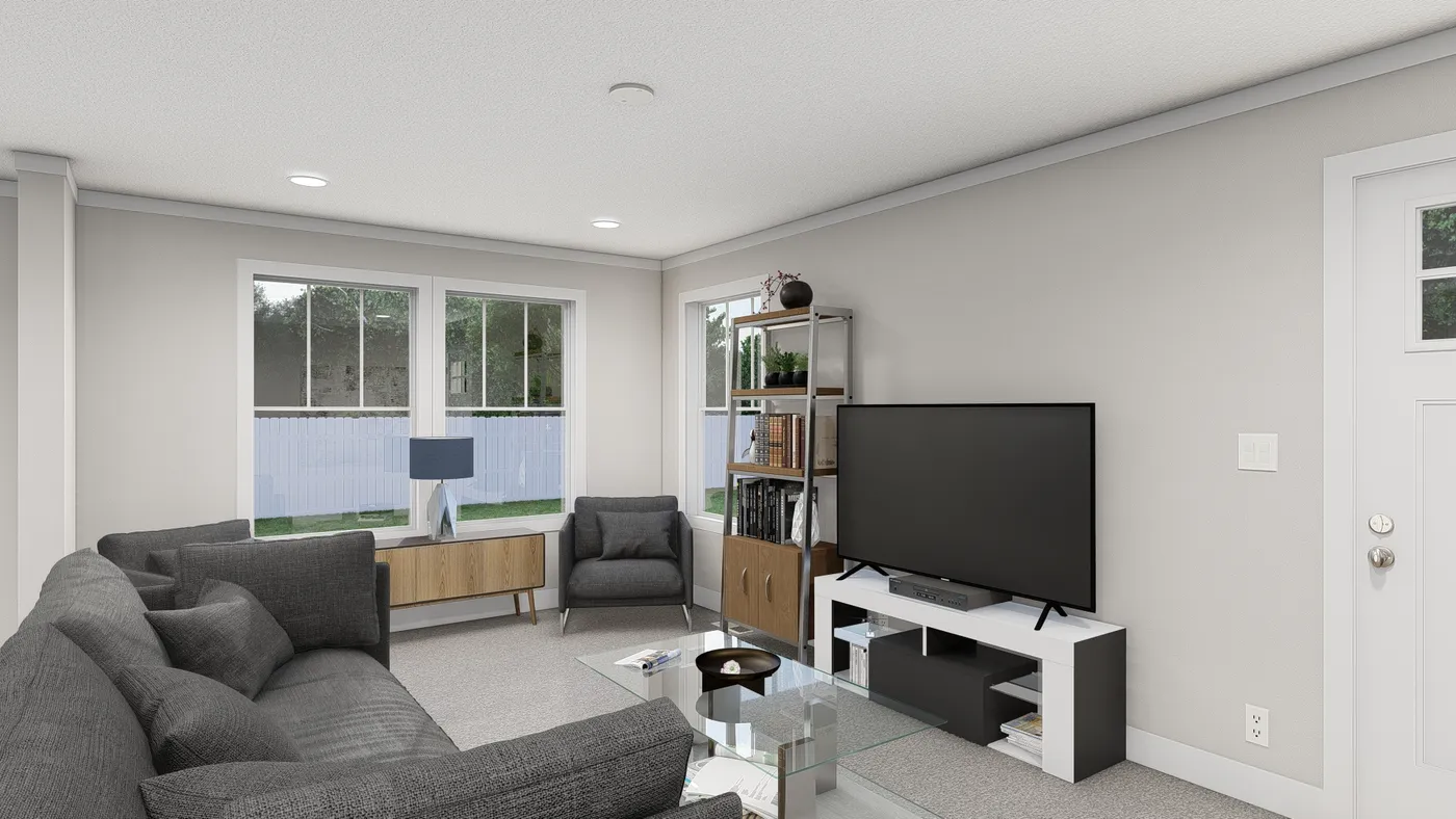 The THREE LITTLE BIRDS Living Room. This Manufactured Mobile Home features 3 bedrooms and 2 baths.