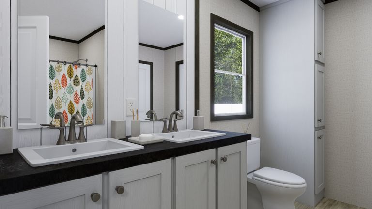 The FLOURISH Primary Bathroom. This Manufactured Mobile Home features 3 bedrooms and 2 baths.