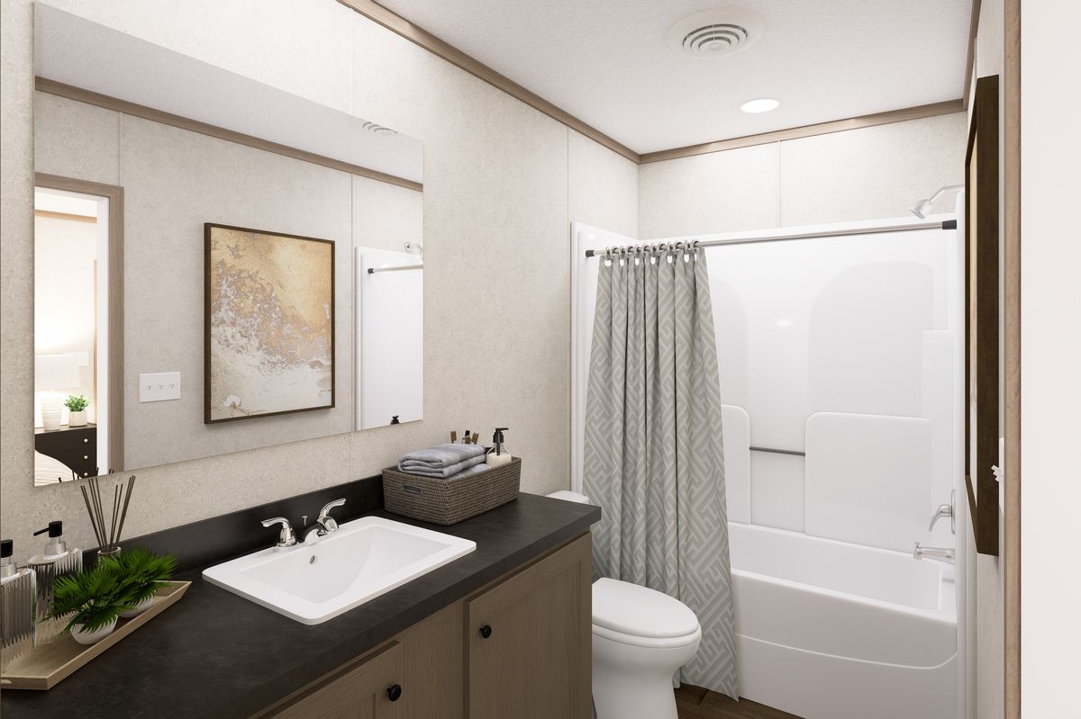 The 6616-CC01 CORNERSTONE 66 Primary Bathroom. This Manufactured Mobile Home features 3 bedrooms and 2 baths.