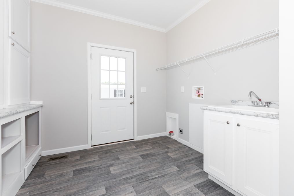 The SUPER 68 ELITE Utility Room. This Manufactured Mobile Home features 3 bedrooms and 2 baths.