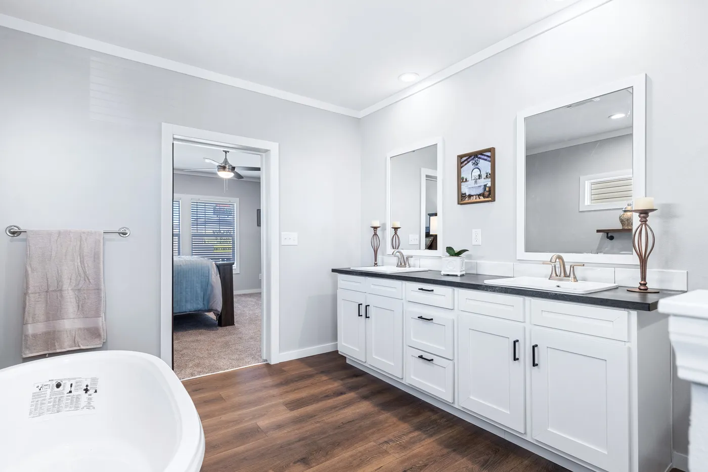 The THE FUJI Primary Bathroom. This Manufactured Mobile Home features 4 bedrooms and 3 baths.