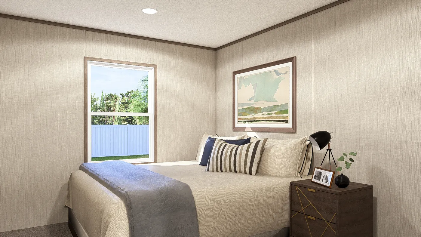 The LEGEND 28X56 3 BR Guest Bedroom. This Manufactured Mobile Home features 3 bedrooms and 2 baths.