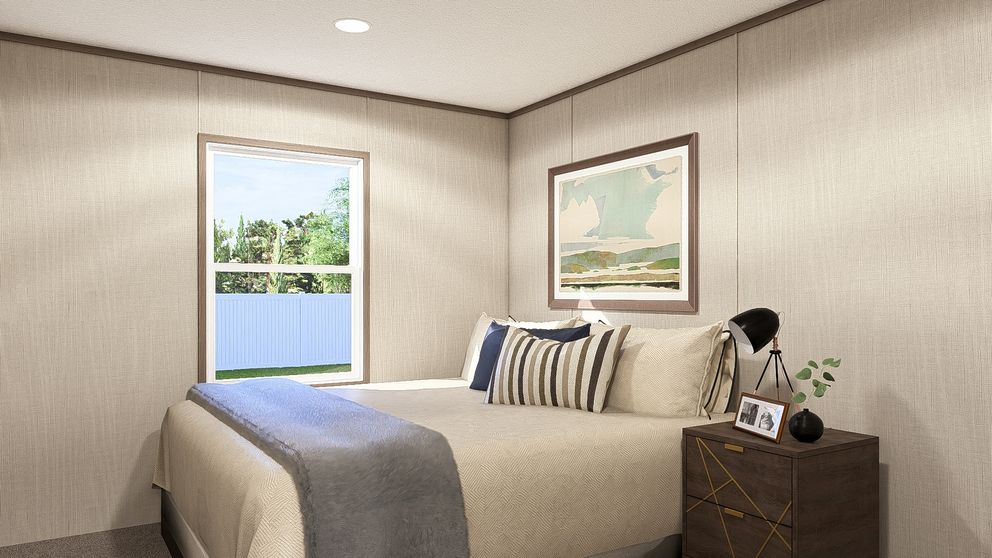 The LEGEND 28X56 3 BR Guest Bedroom. This Manufactured Mobile Home features 3 bedrooms and 2 baths.