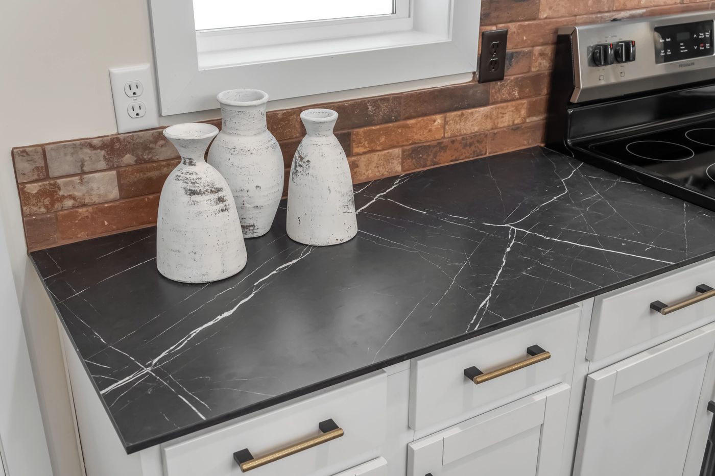 The HIGHLAND/6430-MS060 SECT Kitchen. This Manufactured Mobile Home features 3 bedrooms and 2 baths.