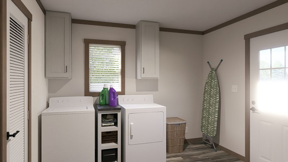 The NELLIE ELITE Utility Room. This Manufactured Mobile Home features 4 bedrooms and 3 baths.