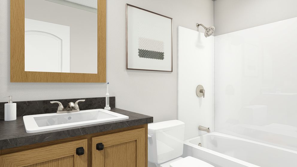 The UNDER PRESSURE 4828-32-1 TEMPO Guest Bathroom. This Manufactured Mobile Home features 3 bedrooms and 2 baths.