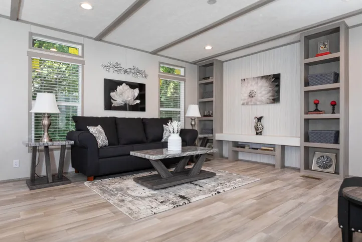 The THE ANNIVERSARY 76 Living Room. This Manufactured Mobile Home features 3 bedrooms and 2 baths.