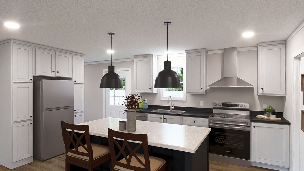 The ROCKET MAN Kitchen. This Manufactured Mobile Home features 3 bedrooms and 2 baths.