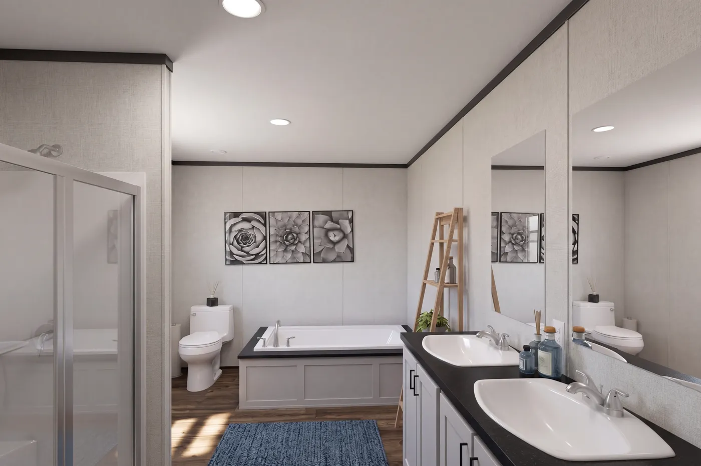 The THE MOUNTAINEER 48 Primary Bathroom. This Manufactured Mobile Home features 3 bedrooms and 2 baths.