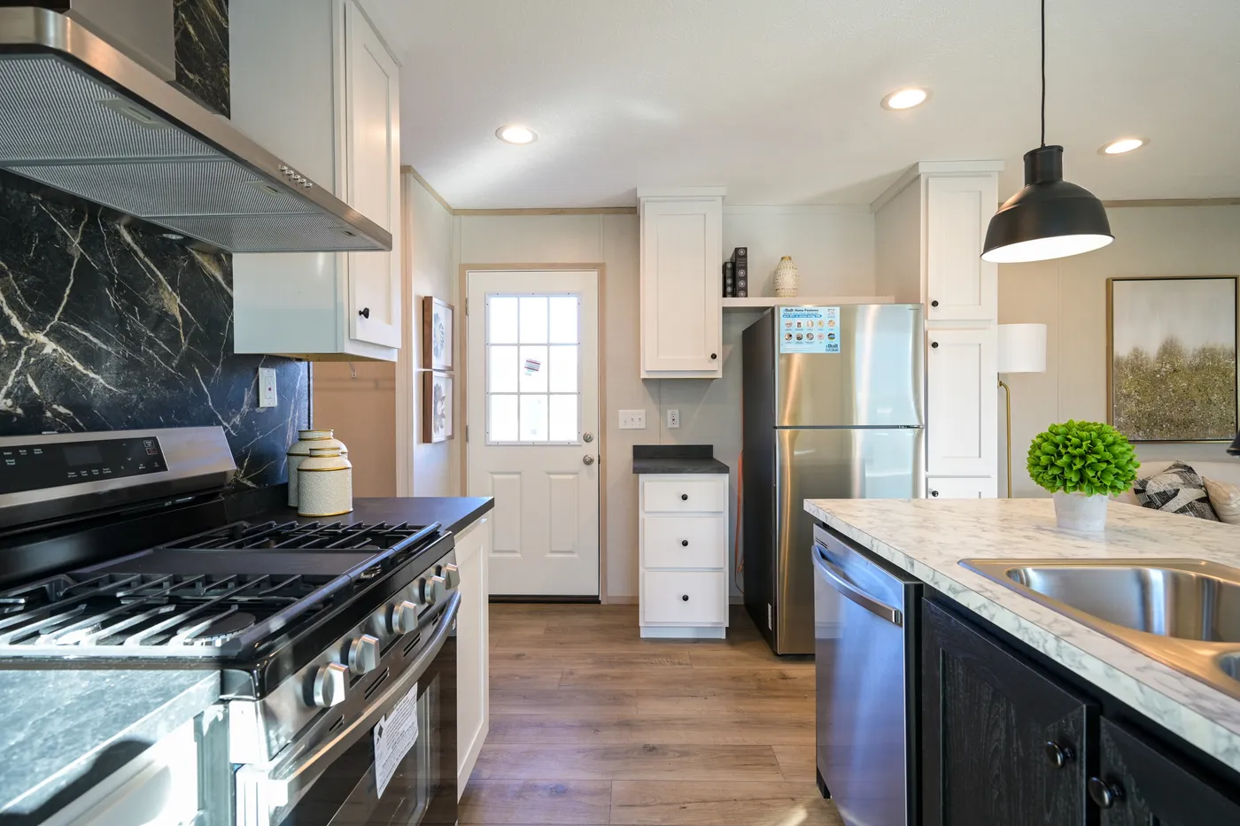 The TIGER'S EYE 7416-456 Kitchen. This Manufactured Mobile Home features 3 bedrooms and 2 baths.