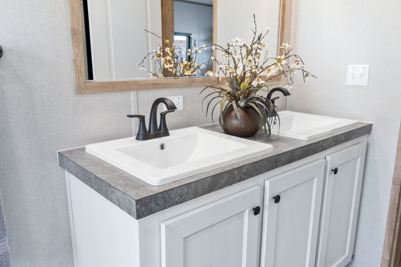 The PT 78 Primary Bathroom. This Manufactured Mobile Home features 3 bedrooms and 2 baths.