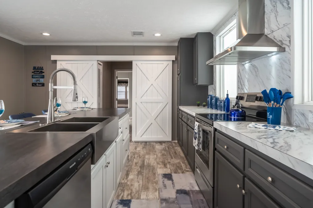 The MAJOR Kitchen. This Manufactured Mobile Home features 3 bedrooms and 2 baths.