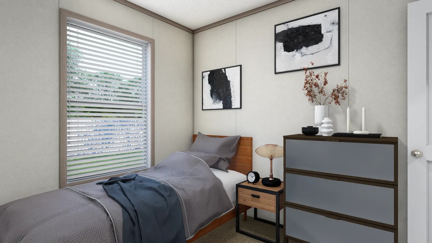 The 6616-4711 THE PULSE Guest Bedroom. This Manufactured Mobile Home features 3 bedrooms and 2 baths.