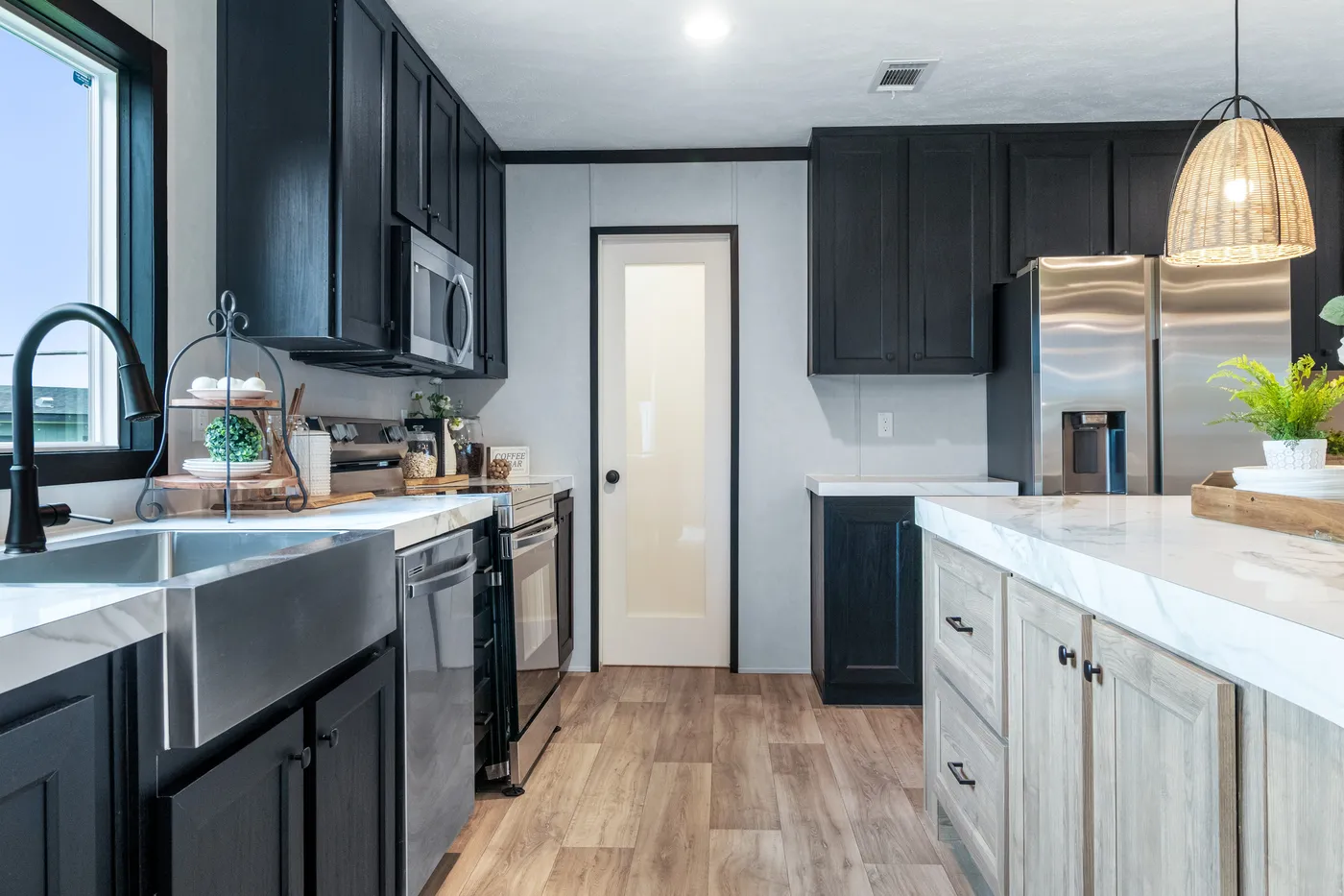 The ODYSSEY Kitchen. This Manufactured Mobile Home features 4 bedrooms and 2 baths.