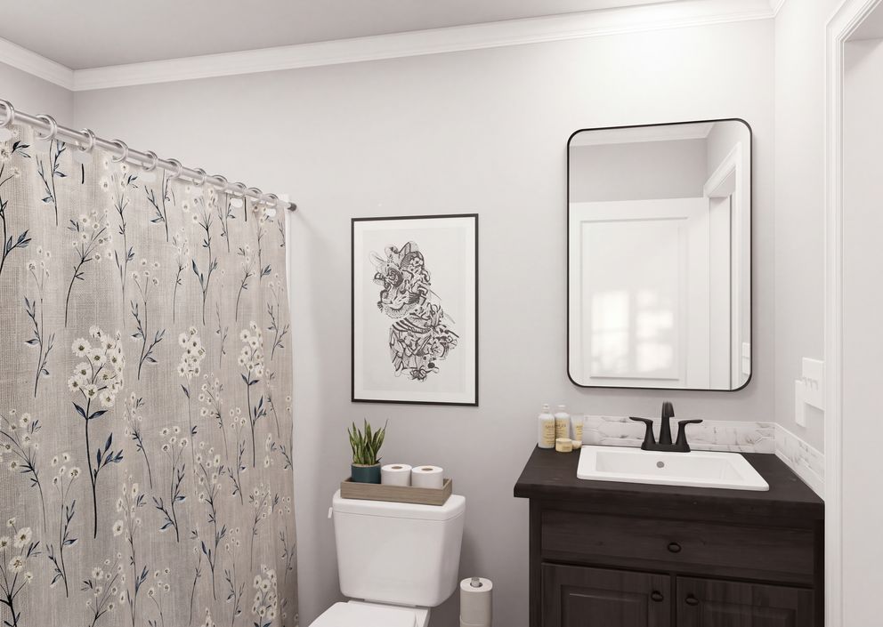 The THE ROOSEVELT Guest Bathroom. This Manufactured Mobile Home features 4 bedrooms and 3 baths.
