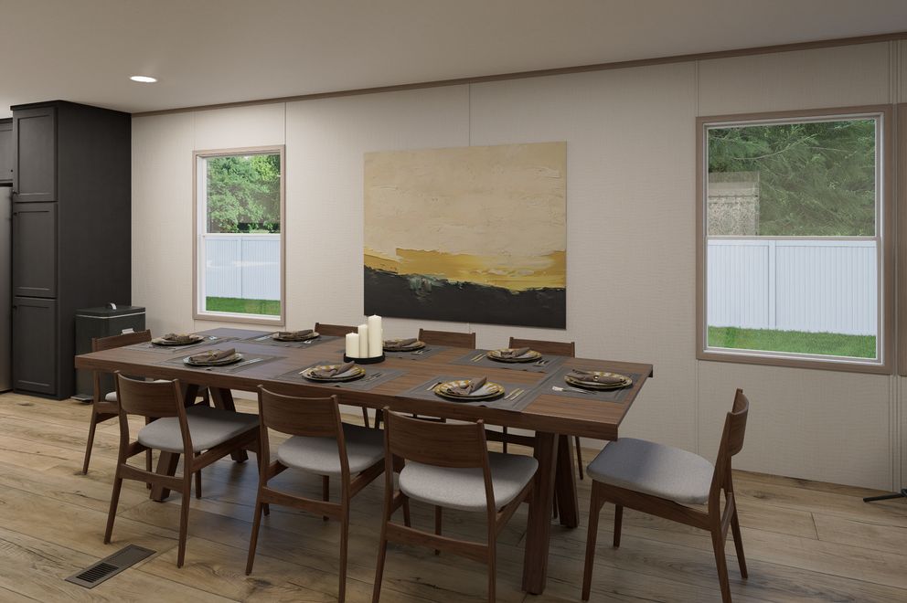 The ULTRA FLEX Dining Area. This Manufactured Mobile Home features 4 bedrooms and 2 baths.