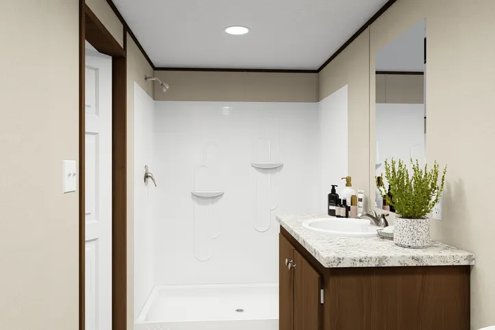 The SPLENDOR Primary Bathroom. This Manufactured Mobile Home features 3 bedrooms and 2 baths.