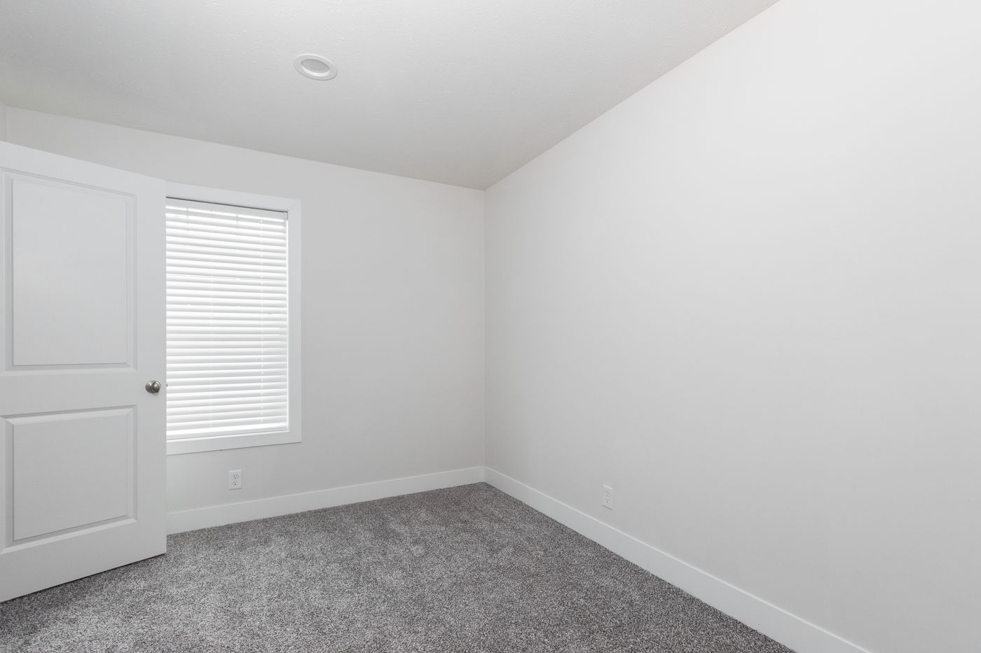 The PIONEER ST 6030-MS064 SECT Guest Bedroom. This Manufactured Mobile Home features 3 bedrooms and 2 baths.