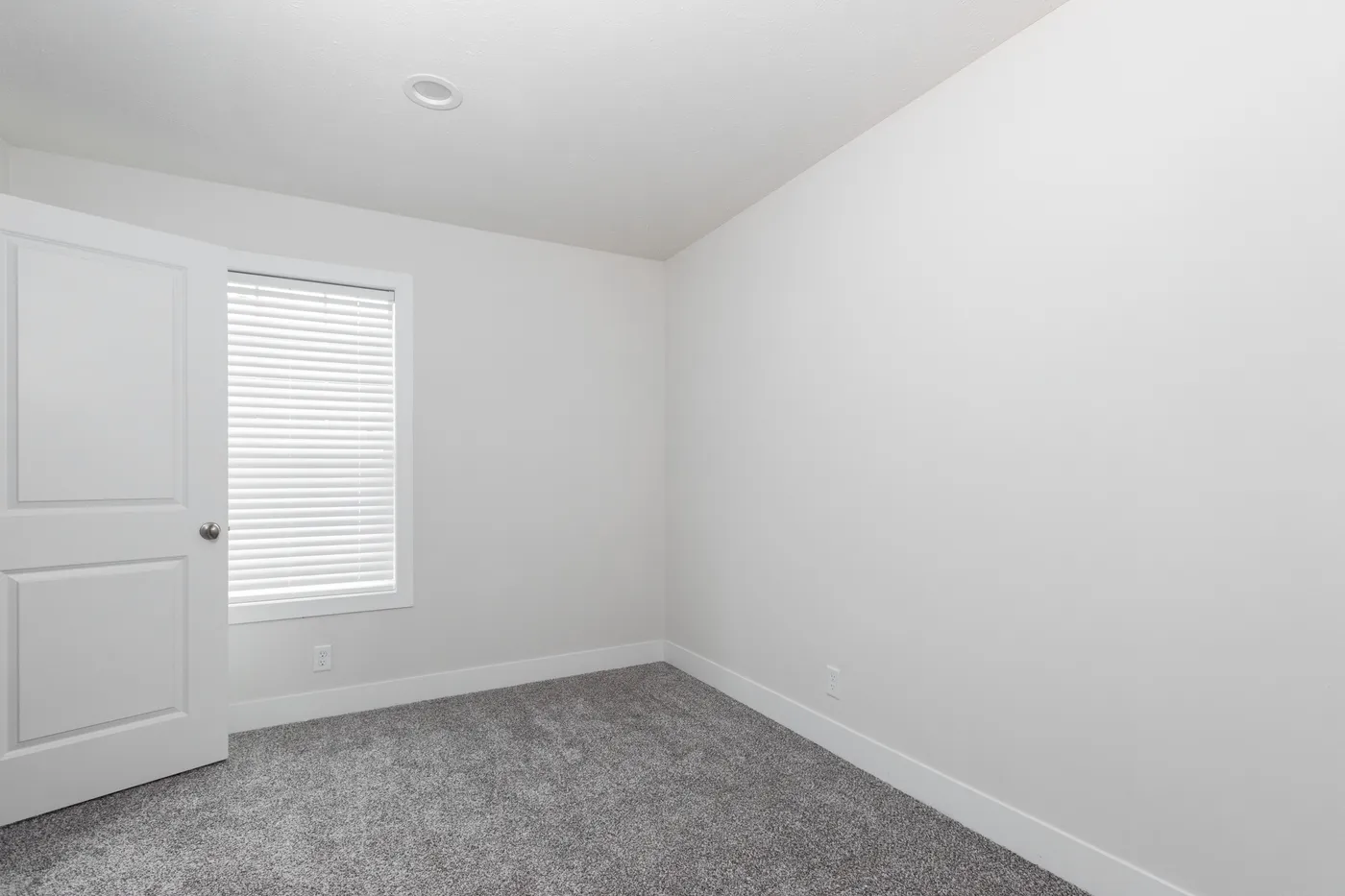The PIONEER ST 6030-MS064 SECT Guest Bedroom. This Manufactured Mobile Home features 3 bedrooms and 2 baths.