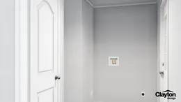 The THE RESERVE 76 Utility Room. This Manufactured Mobile Home features 4 bedrooms and 2 baths.