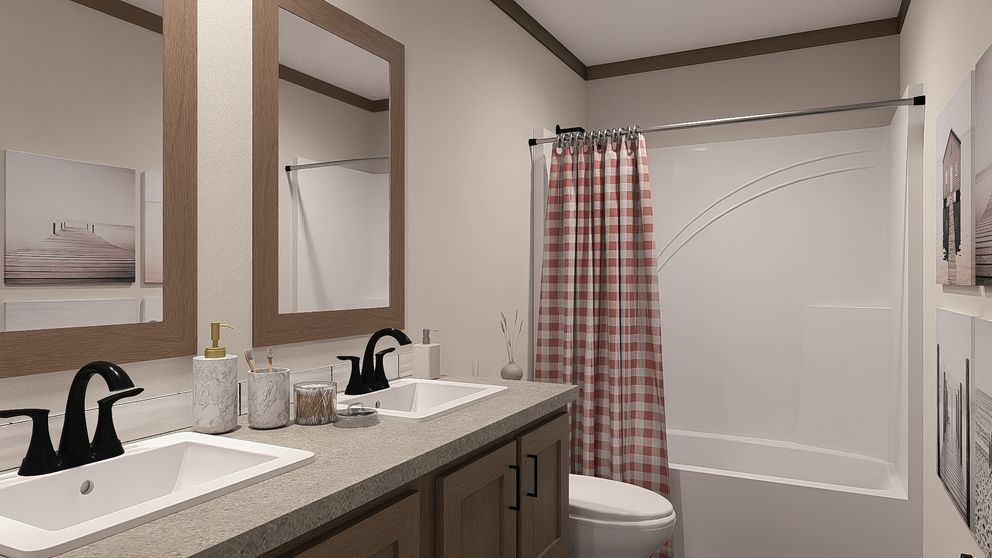 The ISABELLA ELITE Guest Bathroom. This Manufactured Mobile Home features 3 bedrooms and 2 baths.
