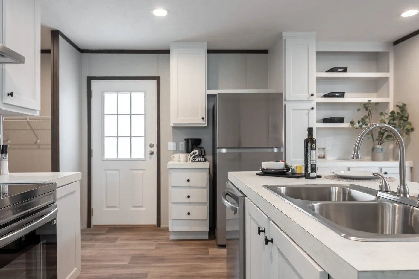 The ESSENCE Kitchen. This Manufactured Mobile Home features 3 bedrooms and 2 baths.