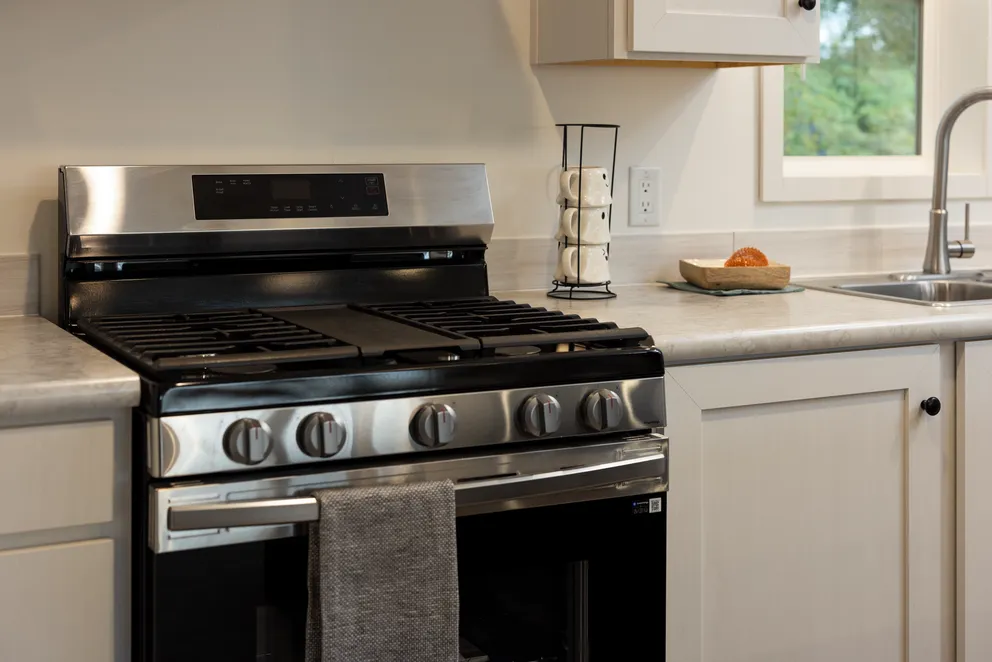 The HEY JUDE Kitchen. This Manufactured Mobile Home features 4 bedrooms and 2 baths.