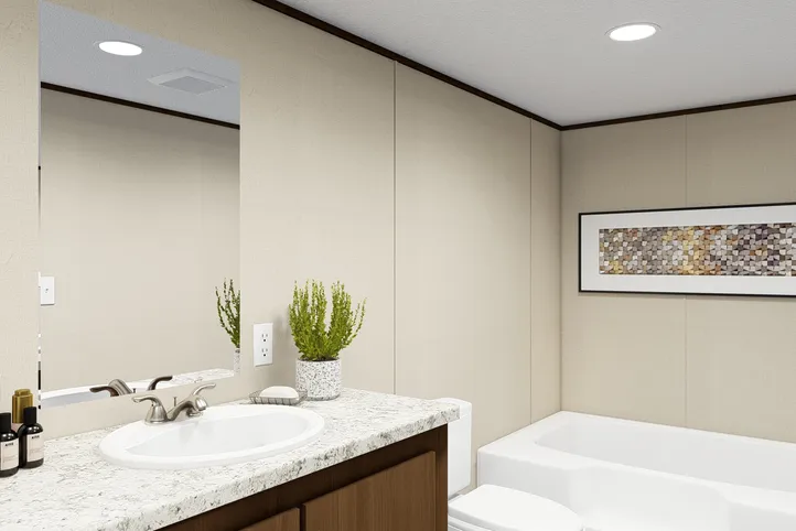 The SPLENDOR Primary Bathroom. This Manufactured Mobile Home features 3 bedrooms and 2 baths.