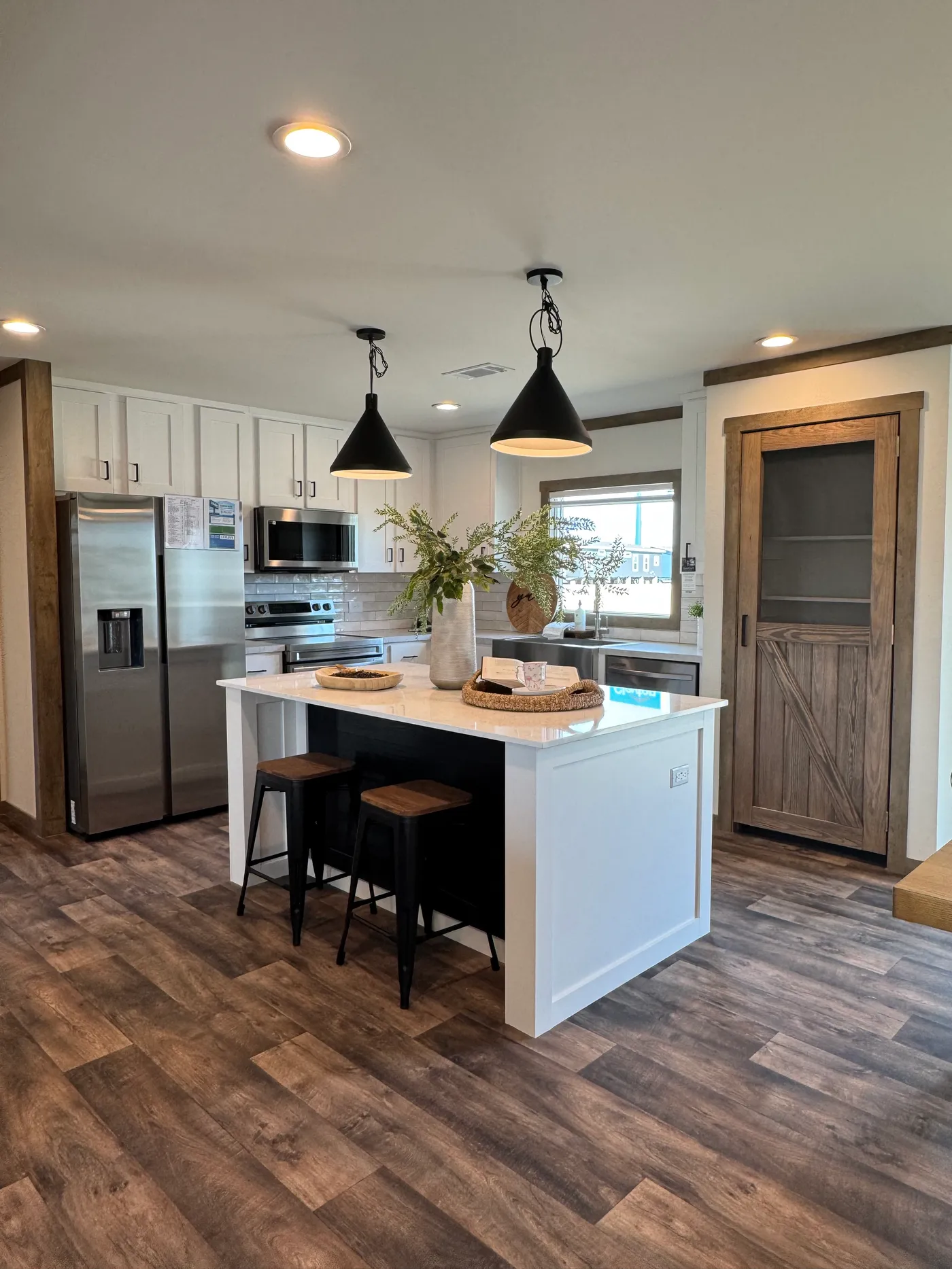 The SAWYER ELITE Kitchen. This Manufactured Mobile Home features 3 bedrooms and 2 baths.