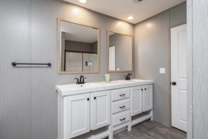 The BLUEBONNET BREEZE Primary Bathroom. This Manufactured Mobile Home features 3 bedrooms and 2 baths.