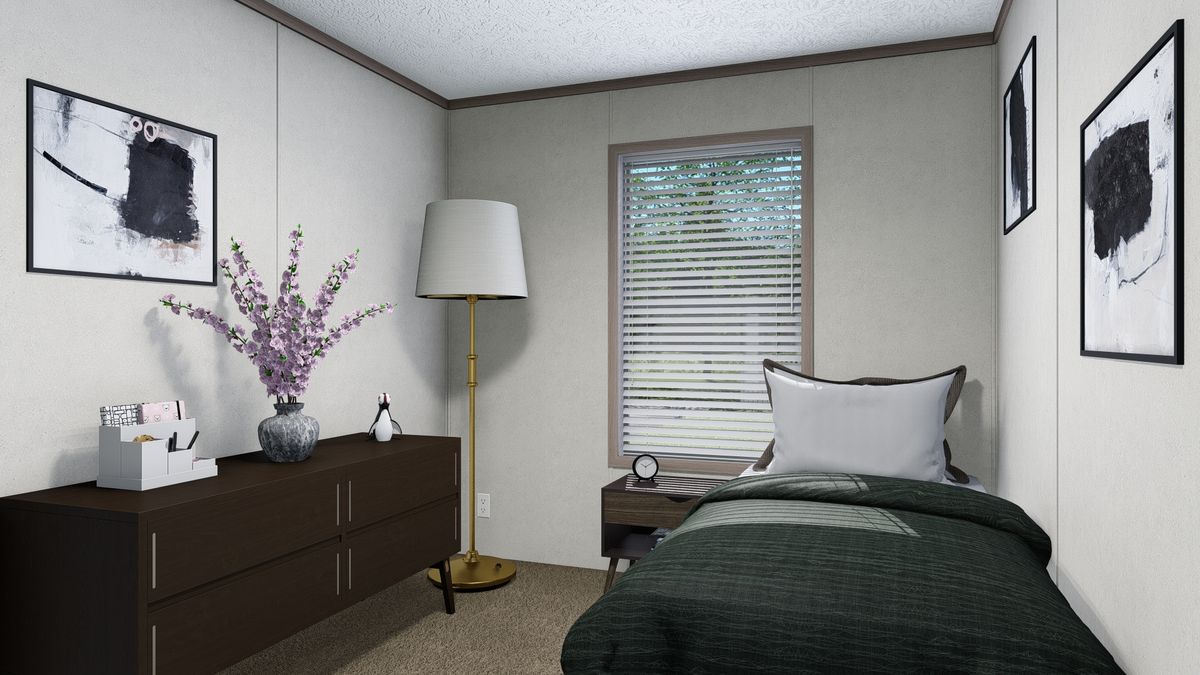 The 5228-5785 THE PULSE Bedroom. This Manufactured Mobile Home features 3 bedrooms and 2 baths.