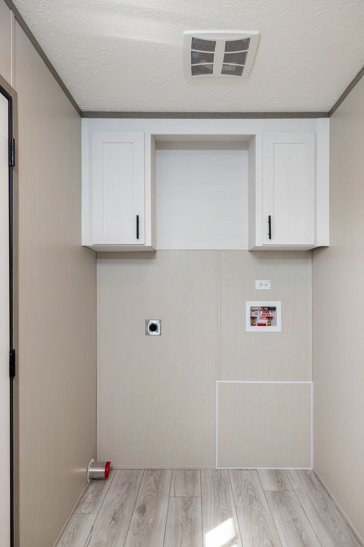 The SHOWER HOUSE Utility Room. This Manufactured Mobile Home features 3 bedrooms and 2 baths.