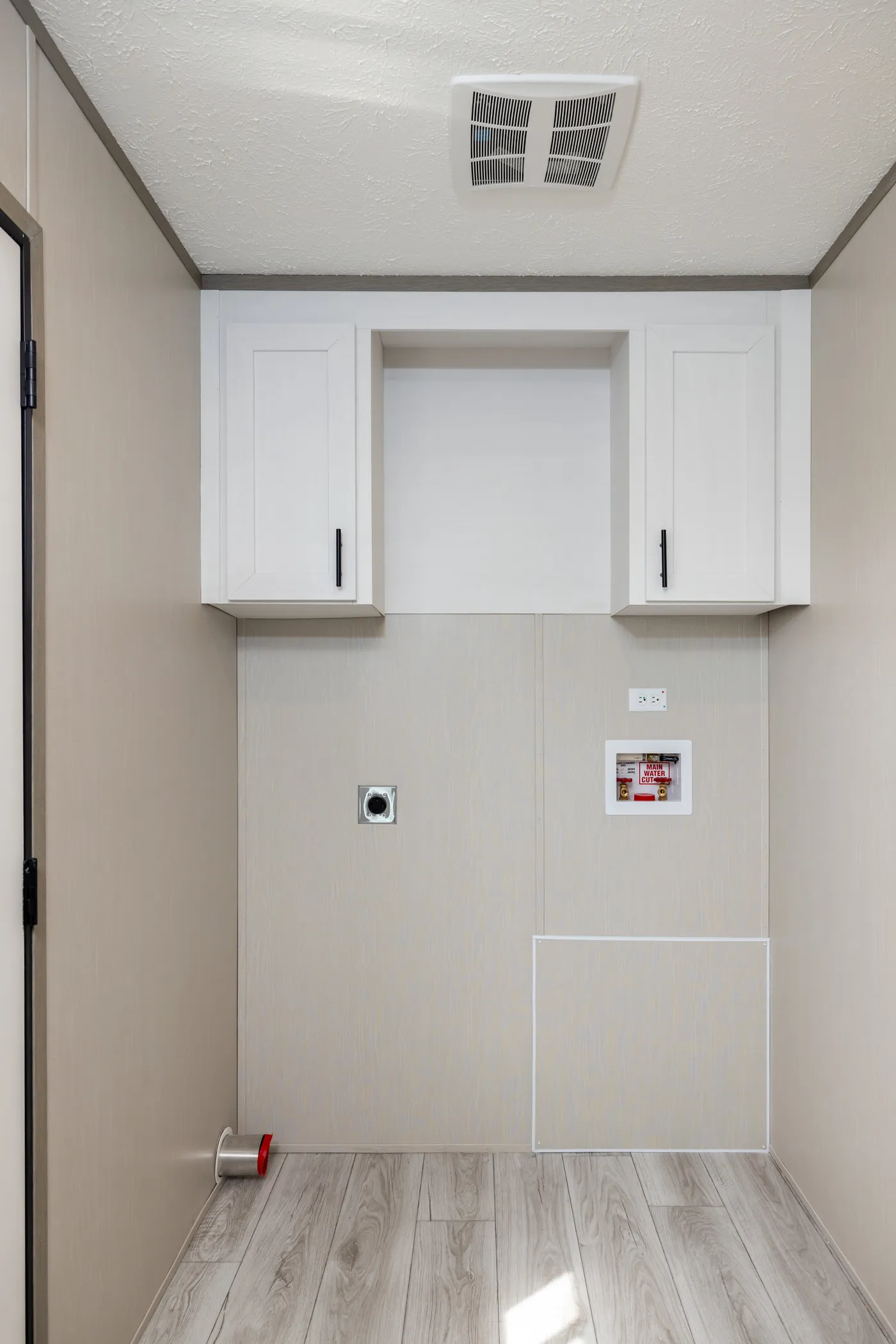 The SHOWER HOUSE Utility Room. This Manufactured Mobile Home features 3 bedrooms and 2 baths.