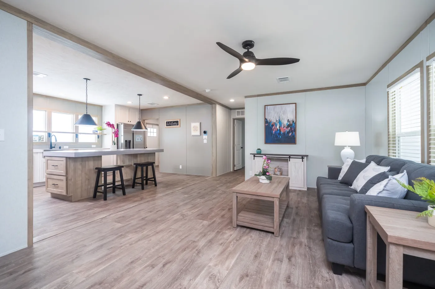 The BLUEBONNET BREEZE Living Room. This Manufactured Mobile Home features 3 bedrooms and 2 baths.